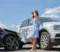 Person examining a car crash scene in Las Vegas while consulting with a car accident lawyer.