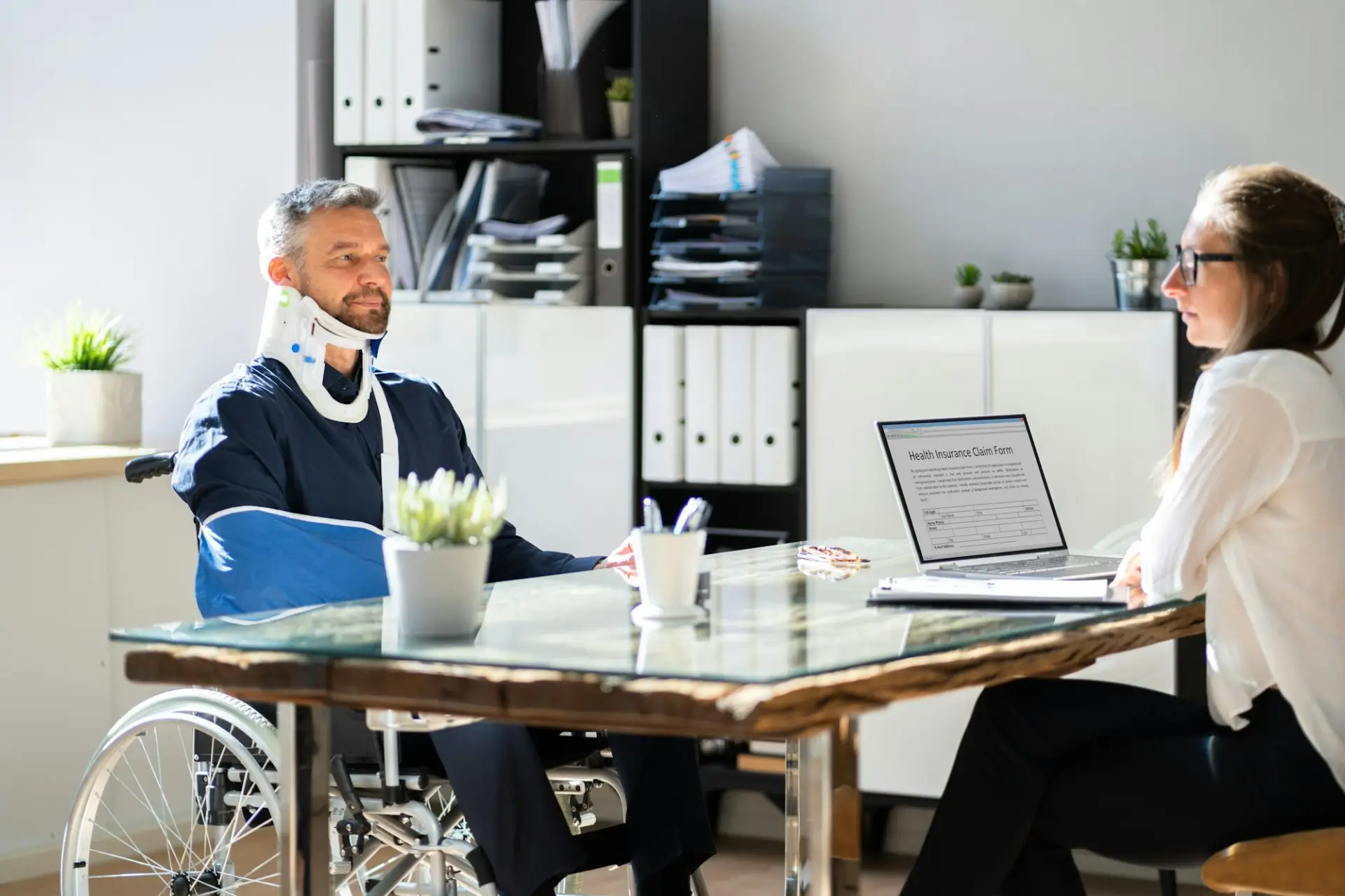 Injured man meeting with truck accident attorney Las Vegas for personal injury case consultation