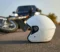 Helmet on the road after a hit-and-run crash, representing cases handled by motorcycle accident lawyers in Las Vegas.